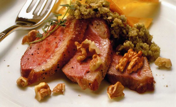 Seared Duck with Roasted Walnuts and Green Olive Tapenade