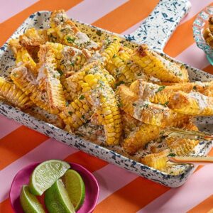 Smoked Paprika-Spiced Corn Ribs with Walnut Parmesan and Walnut Lime Crema